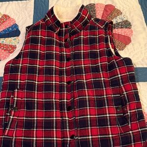 Plaid vest, faux fur lining.